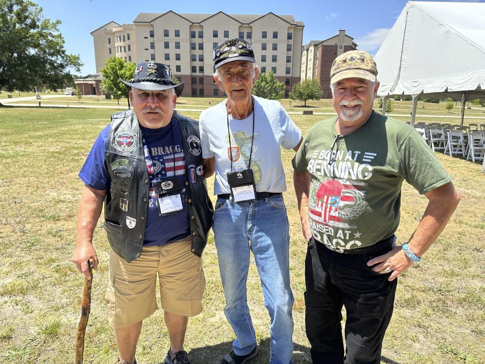 Vincent Ochoa, left, Patrick McGuire, center, and Mark Melancon, right, all veterans of the U.S. Army's 82nd Airborne Division, pose for a photograph following the All American Hall of Fame Induction Ceremony at the military base then called Fort Bragg, on Wednesday, May 24, 2023, in Fort Liberty, N.C. Fort Bragg shed its Confederate namesake Friday, June 2, 2023, to become Fort Liberty in a ceremony some veterans said was a small but important step in making the U.S. Army more welcoming to current and prospective Black service members. (AP Photo/Michelle R. Smith)