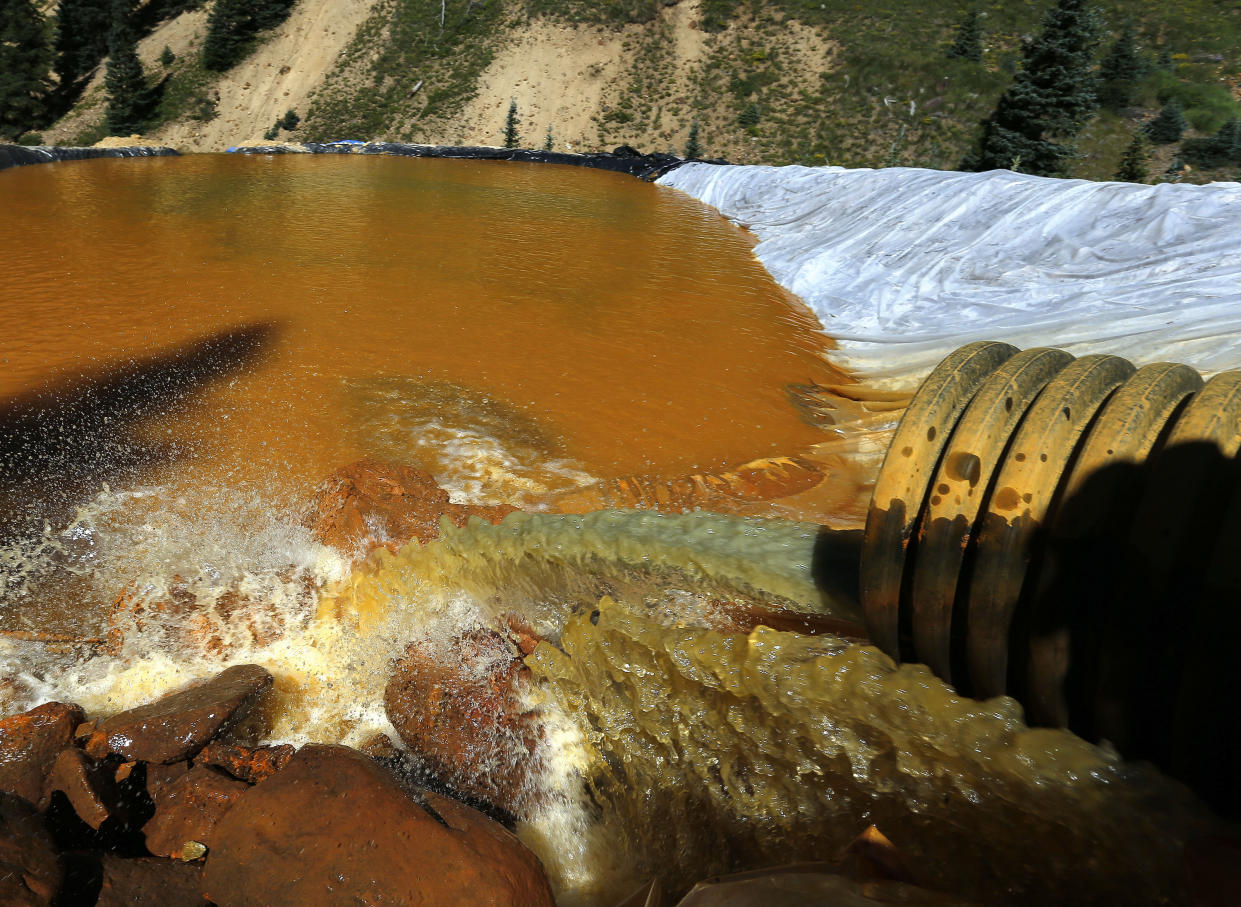 <span class="s1">Water flows through sediment retention ponds built to reduce contaminants from Colorado’s massive Gold King Mine accident in 2015. (Photo: Brennan Linsley/AP)</span>