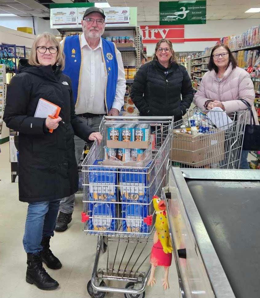 Members of the Wolseley Lions Club purchased approximately $500 worth of food Friday morning to donate to the town's food bank.