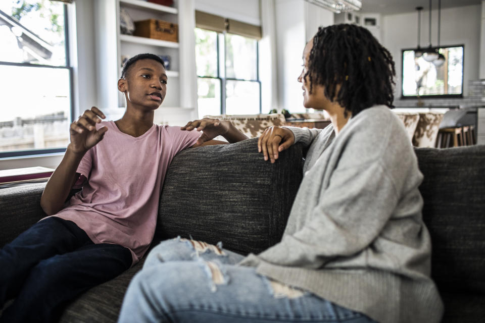 Less is more when talking to kids about cancer. (Image via Getty Images)