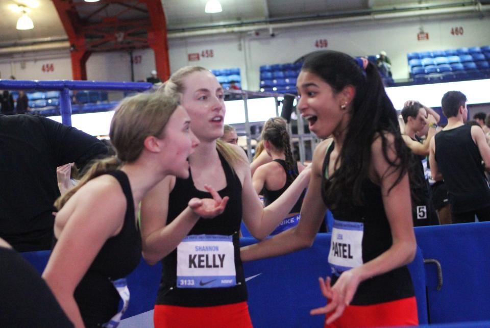 Scarsdale's Eva Gibney, Shannon Kelly and Leia Patel react after finishing fourth in the girls championship 4x800 with teammate Zoe Dichter (not pictured) at Nike Indoor Nationals March 9, 2024.