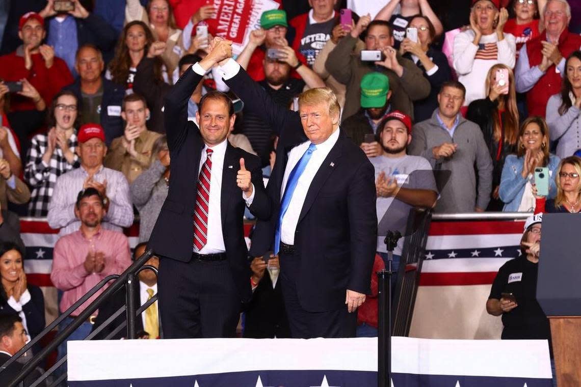 U.S. Rep. Andy Barr joins the stage with President Donald Trump at Eastern Kentucky University’s Alumni Coliseum in Richmond during his rally for re-election in Kentucky’s Sixth Congressional District. Oct 13, 2018.