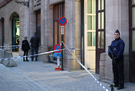 Police keep watch outside the police headquarters after a policeman was stabbed in Brussels, Belgium November 20, 2018. REUTERS/Yves Herman