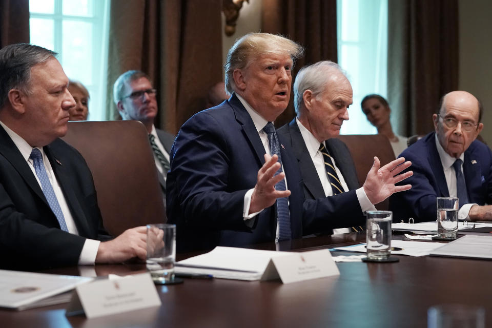 WASHINGTON, DC - JULY 16: U.S. President Donald Trump (C) talks with journalists during a cabinet meeting with (L-R) Secretary of State Mike Pompeo, acting Defense Secretary Richard Spencer, Commerce Secretary Wilbur Ross and others at the White House July 16, 2019 in Washington, DC. Trump and members of his administration addressed a wide variety of subjects, including Iran, opportunity zones, drug prices, HIV/AIDS, immigration and other subjects for more than an hour. (Photo by Chip Somodevilla/Getty Images)