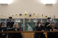 The painting which was found last December near an art gallery and believed to be the missing Gustav Klimt's painting ‘Portrait of a Lady’ is displayed during a press conference in Piacenza, Italy, Friday, Jan. 17, 2020. Art experts have confirmed that a stolen painting discovered hidden inside an Italian art gallery's walls is Gustav Klimt's "Portrait of a Lady," Italian prosecutors said Friday. A gardener reported finding an art work inside a bag last month while clearing ivy at the Ricci Oddi Modern Art Gallery in the northern city of Piacenza. “Portrait of a Lady” disappeared from the gallery during renovation work in February 1997. (AP Photo/Antonio Calanni)