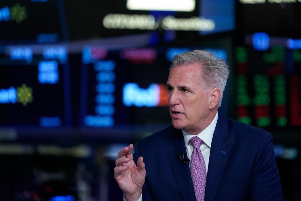 Speaker of the House Kevin McCarthy talks to a reporter on the floor of the New York Stock Exchange in New York, Monday, April 17, 2023. (AP Photo/Seth Wenig) ORG XMIT: NYSW118