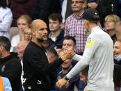 Chelsea's head coach Thomas Tuchel, right, shakes hands with Manchester City's head coach Pep Guardiola at the end of the English Premier League soccer match between Chelsea and Manchester City at Stamford Bridge Stadium in London, Saturday, Sept. 25, 2021. (AP Photo/Alastair Grant)