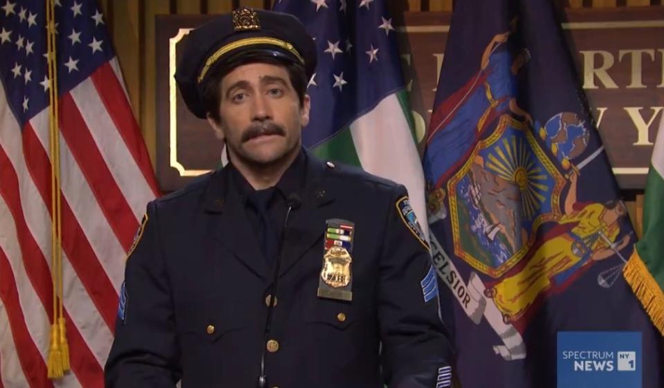 Saturday Night Live host Jake Gyllenhaal played a police sergeant detailing a new task force to help stop character actors from being punched. X/SNL