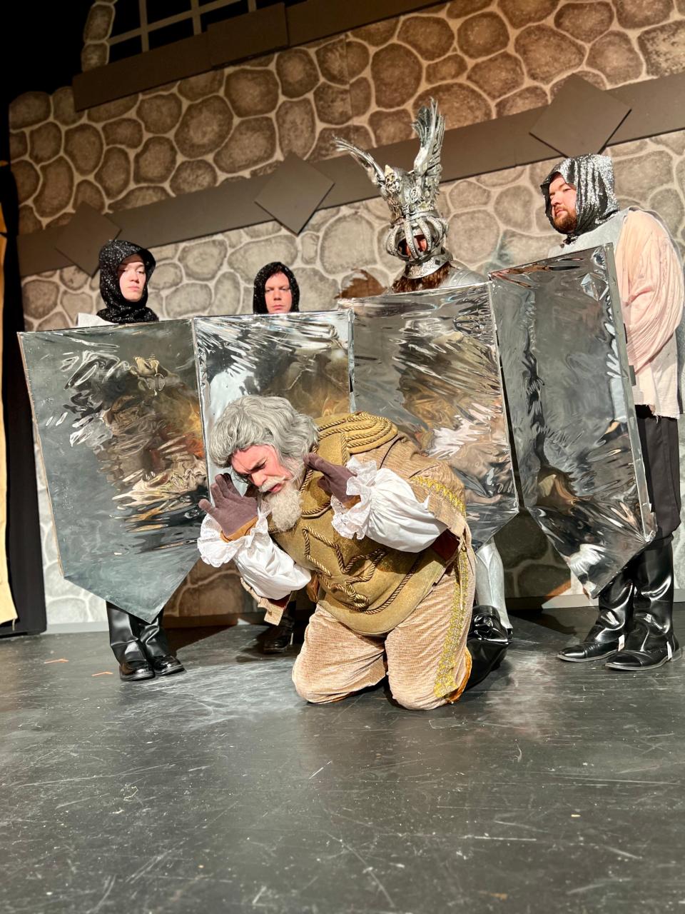 Don Quixote (Max Levine) is being show who he really is by the Knight of the Mirrors and his attendants (L to R) Aarom Shanor, Scott Thompson, Ben Simon and Mikey Schrum in Center Theatre Players' "Man of La Mancha."