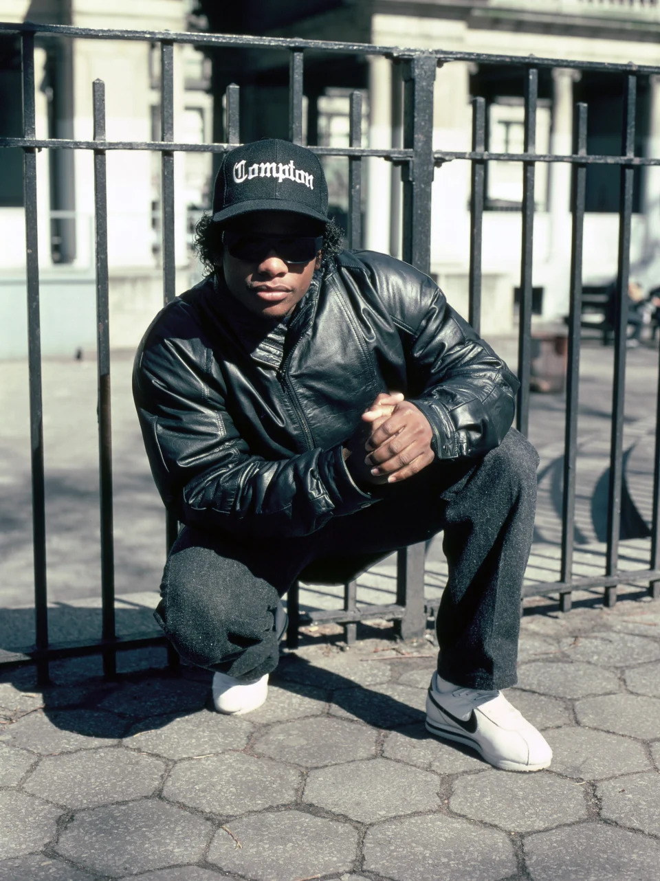 Eazy-E Wearing Black Leather Jacket And Compton Hat