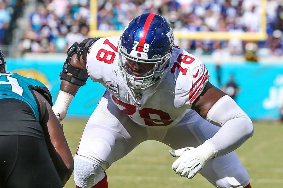 New York Giants offensive tackle Andrew Thomas (78) sets to block during an NFL football game against the Jacksonville Jaguars on Sunday, Oct. 23, 2022, in Jacksonville, Fla. (AP Photo/Gary McCullough)