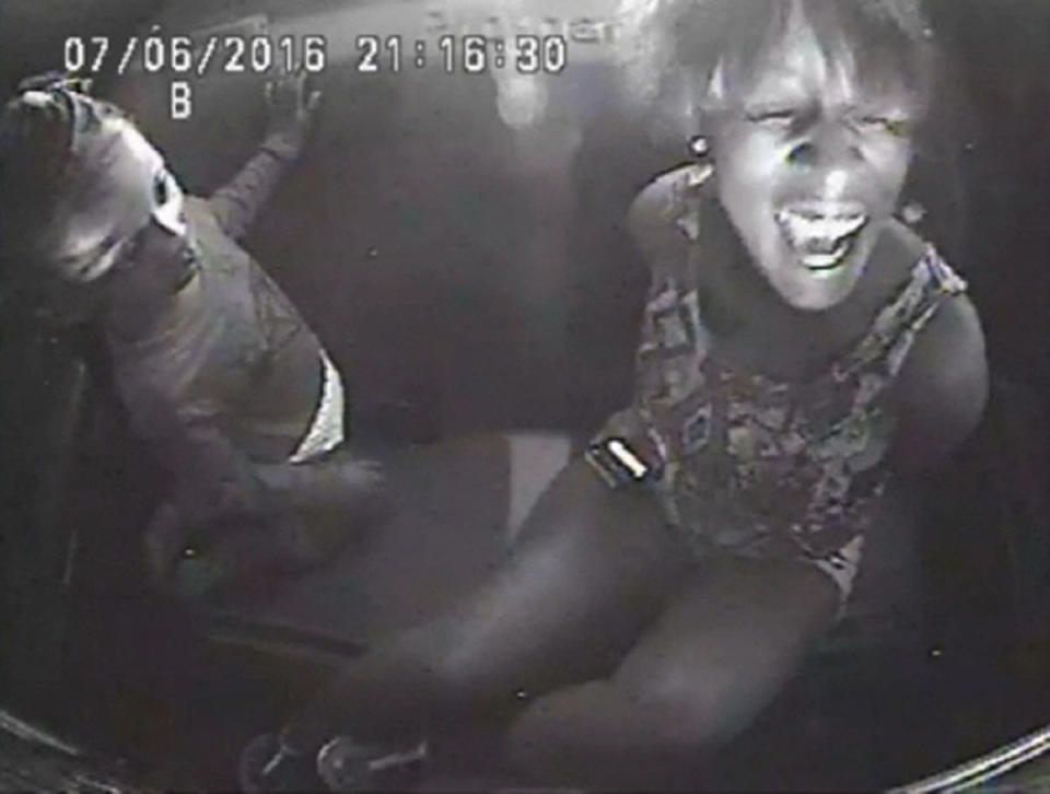 A still image from police video shows Diamond Reynolds crying beside her daughter while handcuffed in the back seat of a police patrol vehicle, after her boyfriend, Philando Castile, was fatally shot. (Photo: Handout / Reuters)