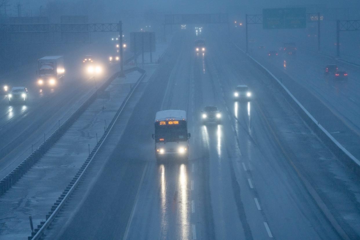 There is light traffic on the New Jersey Turnpike during Tuesday morning's commute as a mixture of snow and rain fall in Ridgefield Park, NJ on Feb. 13, 2024.