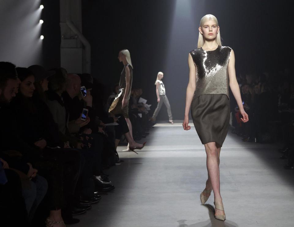 Models walk the runway during the showing of the Narciso Rodriguez Fall 2014 collection at Fashion Week in New York, Tuesday, Feb. 11, 2014. (AP Photo/Kathy Willens)