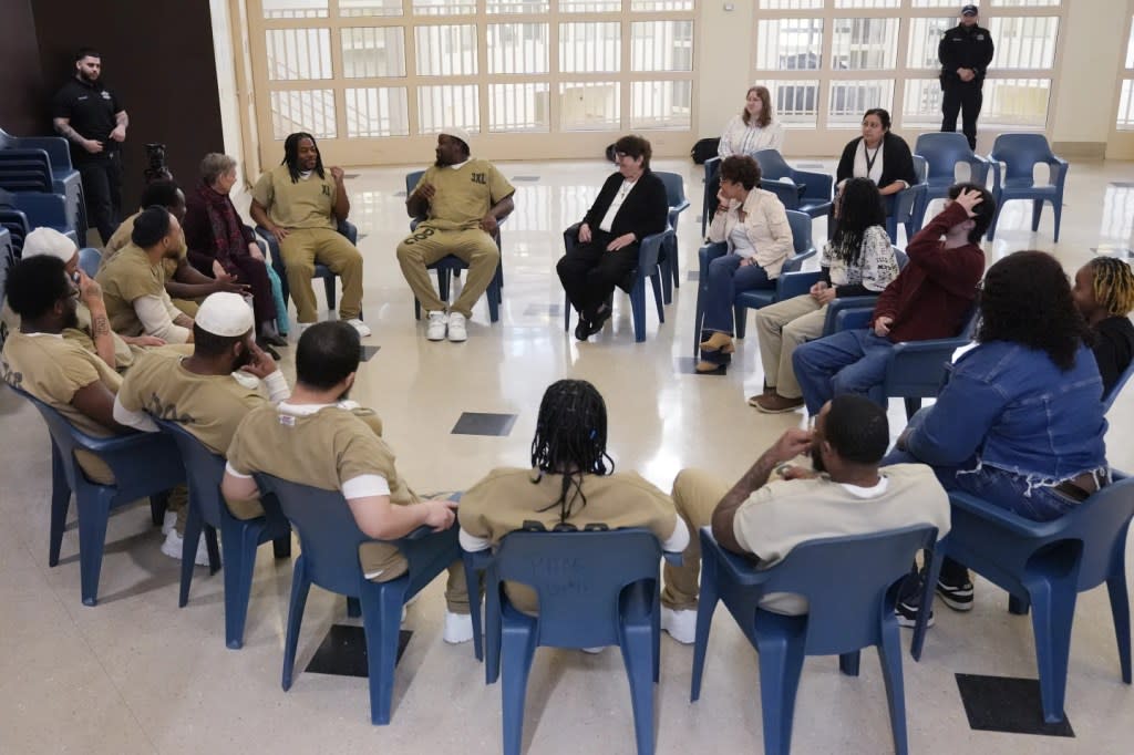 Detainees, DePaul students, and Sister Helen Prejean attend a book club at Department Of Corrections Division 11 in Chicago, Monday, April 22, 2024. (AP Photo/Nam Y. Huh)