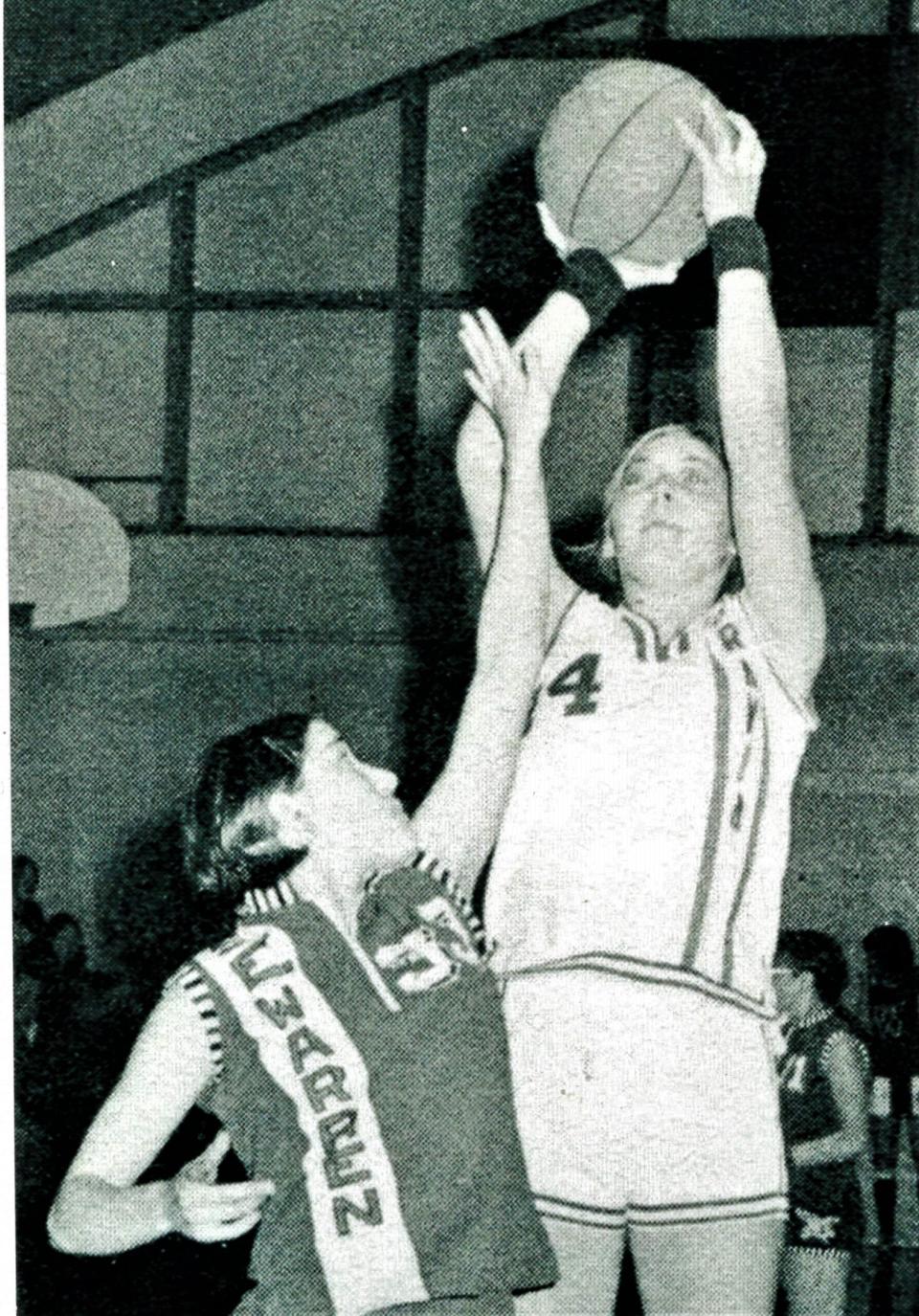 Molly Van Benthuysen shoots a jumper over a Southeast Warren player while playing for Moravia as an Iowa prep.