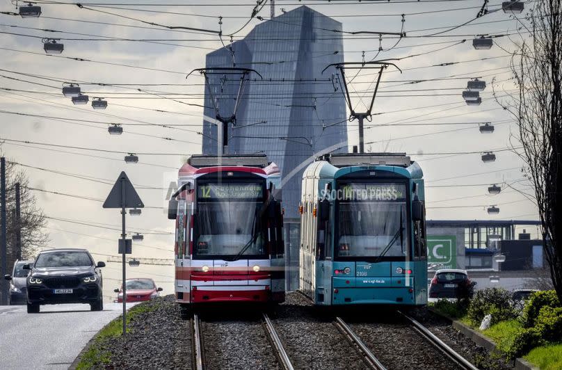 Trams are pictured near the European Central Bank in Frankfurt, Germany.