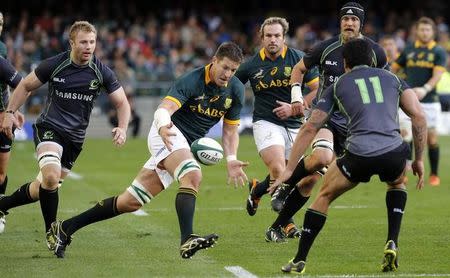 South Africa's Bakkies Botha (C) gathers the ball during their rugby union match against the Rest of the World XV in Cape Town June 7, 2014. REUTERS/Mike Hutchings