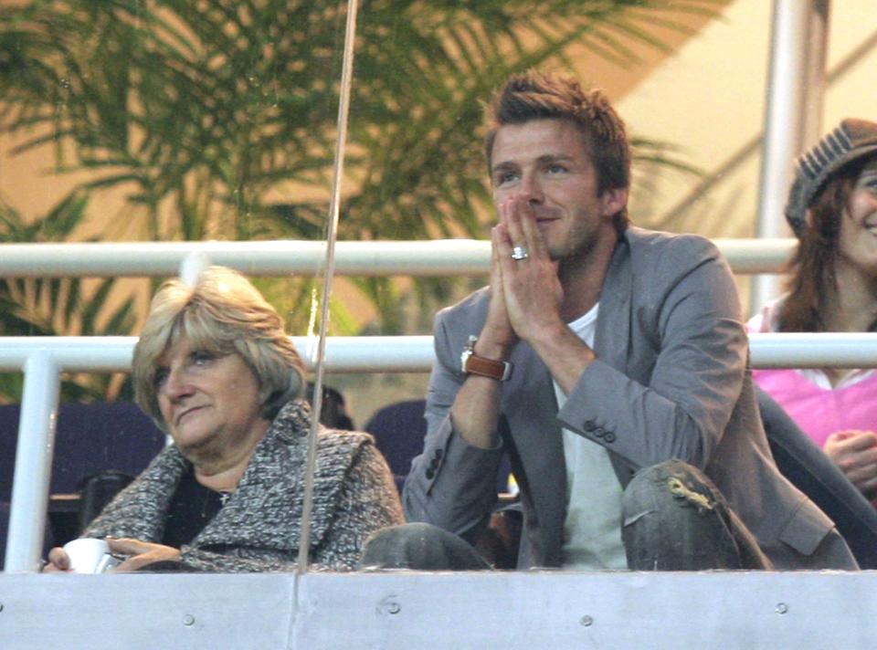 David Beckham of Real Madrid and his mother Sandra Beckham watch the La Liga match between Real Madrid and Real Zaragoza at the Santiago Bernabeu Stadium on January 14, 2007 in Madrid, Spain. (Photo by Denis Doyle/Getty Images)