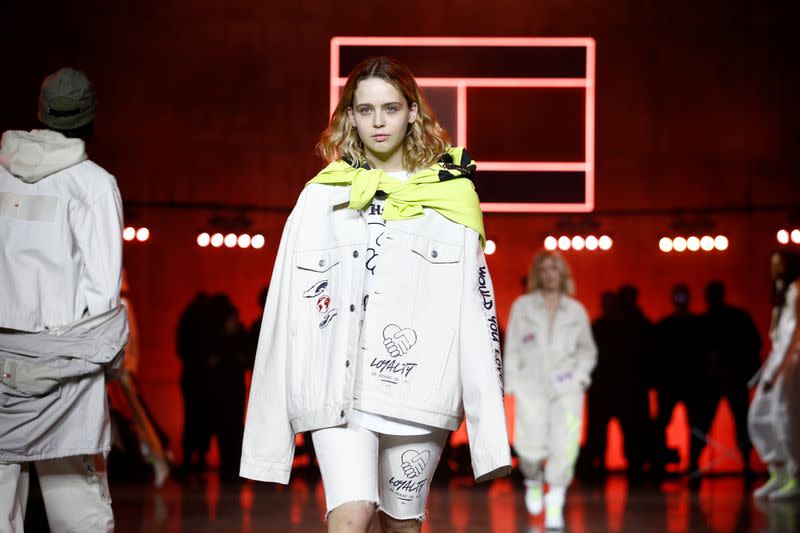 Models present creations during the Tommy Hilfiger 'TOMMYNOW Spring 2020' show during London Fashion Week in London