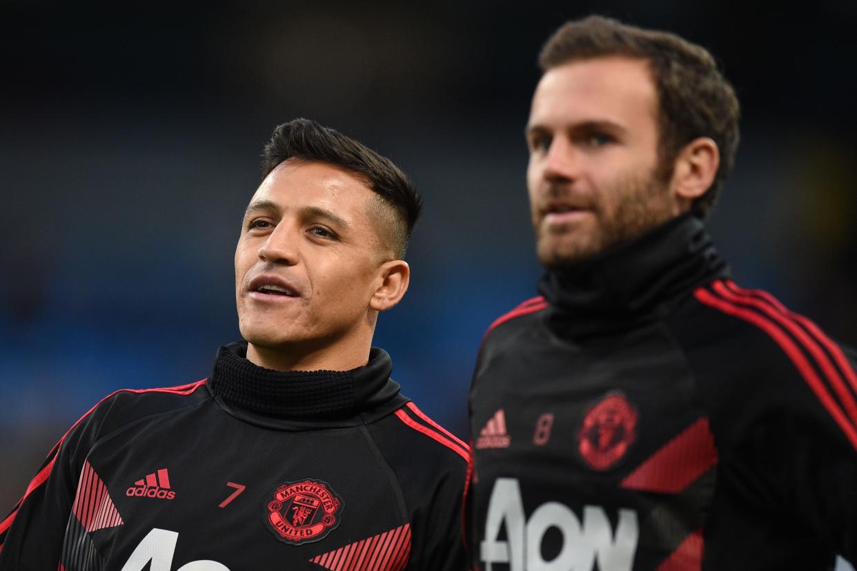 Fans have been left fuming after Alexis Sanchez and Juan Mata were seen laughing during Manchester United’s loss to rivals Man City
