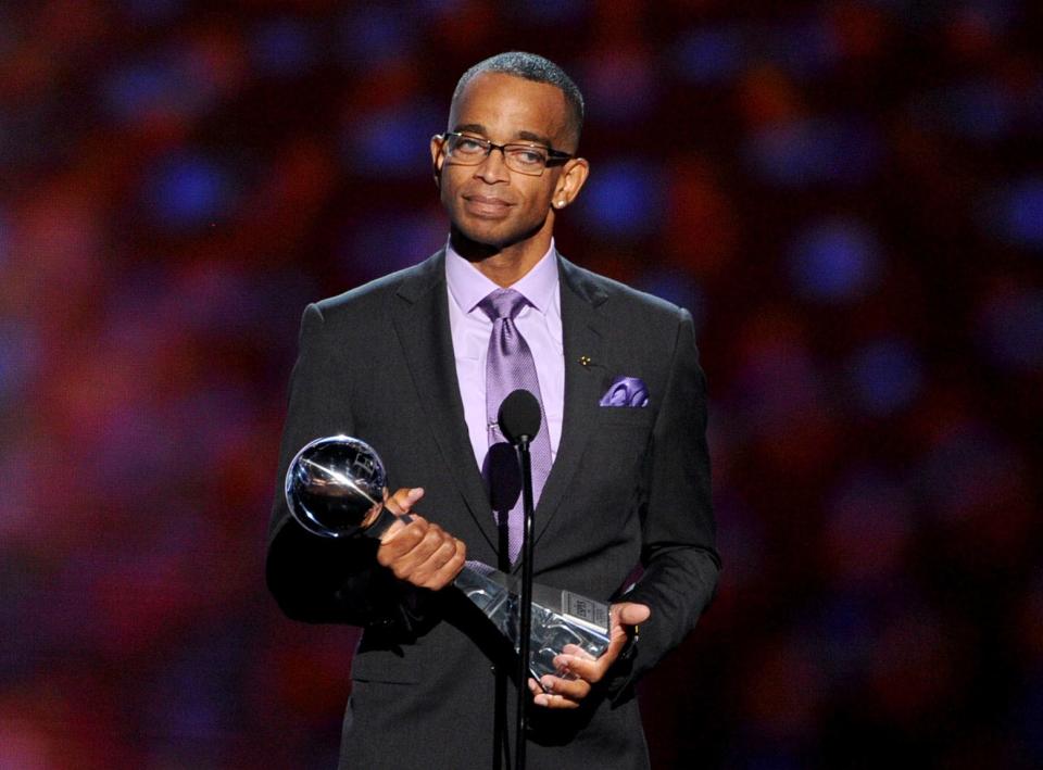 Longtime ESPN anchor Stuart Scott, here accepting the 2014 Jimmy V Award in Los Angeles, died in January 2015 after a lengthy battle with cancer. He was 49.