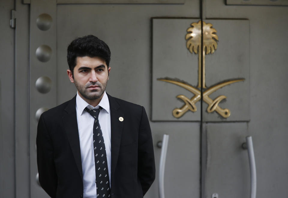 A security guard stands at the entrance of Saudi Arabia consulate in Istanbul, Thursday, Oct. 18, 2018. Turkish crime-scene investigators finished an overnight search of both the consul general's residence and a second search of the consulate itself amid Ankara's fears that Saudi writer Jamal Khashoggi was killed and dismembered inside the diplomatic mission in Istanbul. (AP Photo/Lefteris Pitarakis)