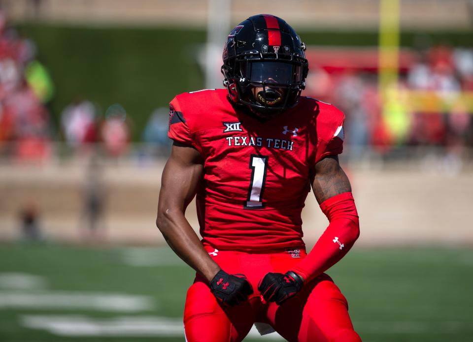 Texas Tech football players including leading receiver Myles Price (1) received one-year, $25,000 contracts with the Matador Club in July in relation to their name, image and likeness. Matador Club board member Cody Campbell says the club has had more than 3,000 contributors and expects to announce more teamwide agreements in the near future.