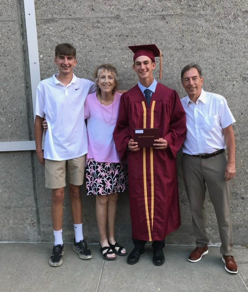 From left, Ryan Brooks, Janet Hourihan Brooks, Dan Brooks and Bill Brooks pose together after Dan graduated from Shepherd Hill.