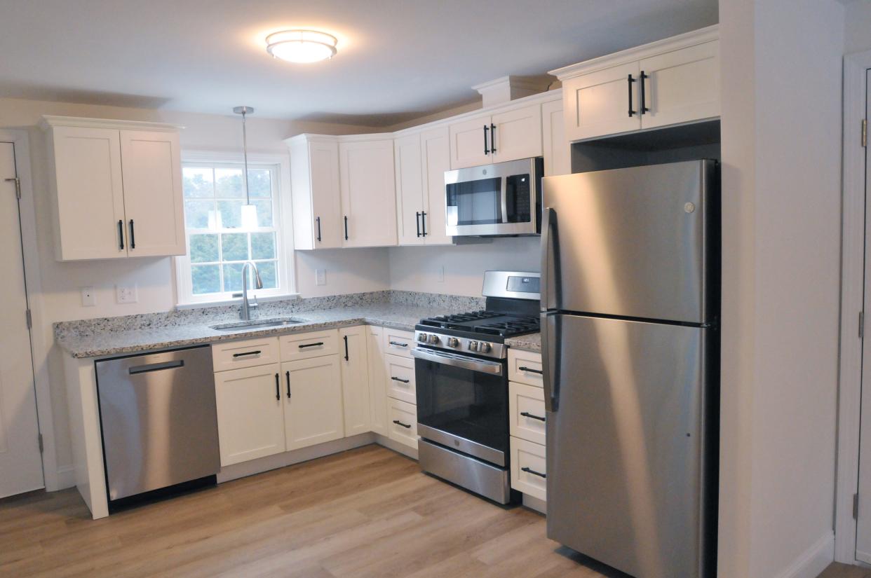 The kitchen at 212 Yankee Drive sits just off the main entrance of the home and was completely redone with new appliances, cabinets and counter tops.