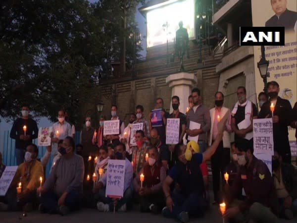 Members of the Congress hold candlelight vigil in Shimla. (Photo/ANI)