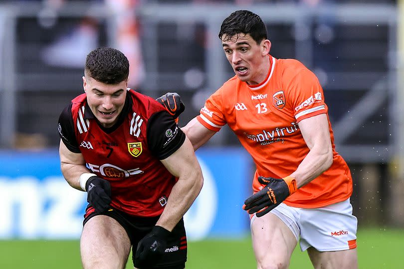 Down's Daniel Guinness in action against Armagh's Rory Grugan during last season's Ulster SFC semi-final at Clones