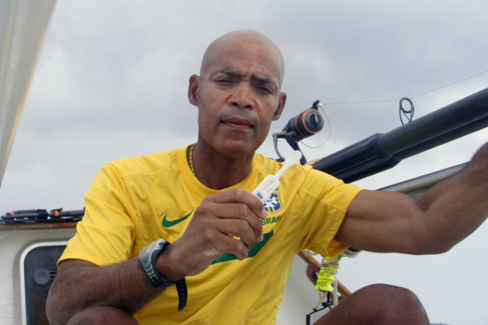 This undated photo provided by G.C. Media shows Victor Mooney on the Spirit of Malabo in the Atlantic Ocean. Mooney who hopes to cross the Atlantic Ocean in honor of his brother who died of AIDS in 1983, passed the halfway mark, Sunday, May 11, 2014. He has tried the same feat three other times, without success. (AP Photo/G.C. Media)