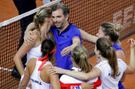 Tennis - Fed Cup - World Group Semi-Final - France v Romania - Kindarena, Rouen, France - April 21, 2019 Captain Julien Benneteau celebrates victory in the semi-final with team mates REUTERS/Charles Platiau