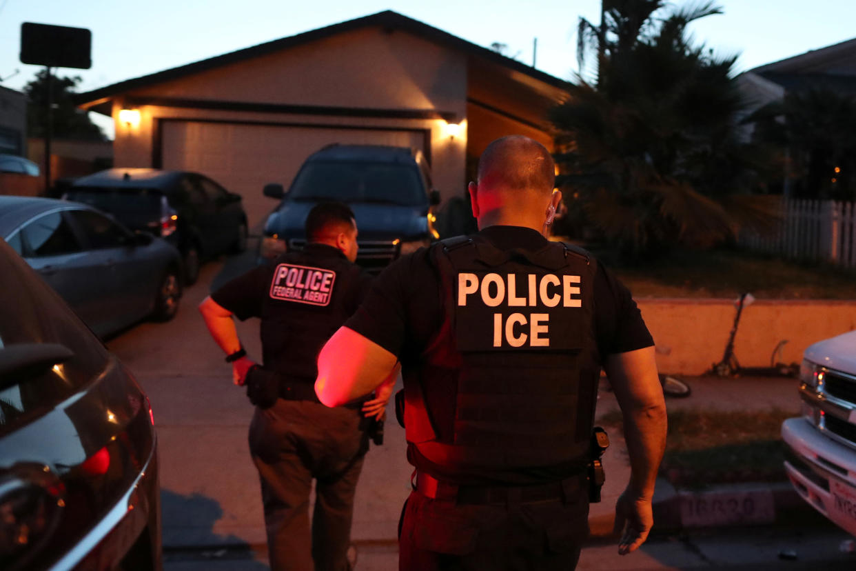 ICE Field Office Director, Enforcement and Removal Operations, David Marin and U.S. Immigration and Customs Enforcement's (ICE) Fugitive Operations team arrive to arrest a Mexican national at a home in Paramount, Calif. on March 1, 2020. (Lucy Nicholson/Reuters)