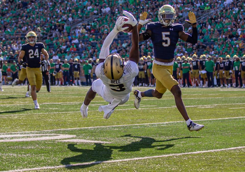 Purdue's David Bell (3) makes a catch next to Notre Dame’s Cam Hart (5) during the Notre Dame vs. Purdue NCAA football game Saturday, Sept. 18, 2021 at Notre Dame Stadium in South Bend.