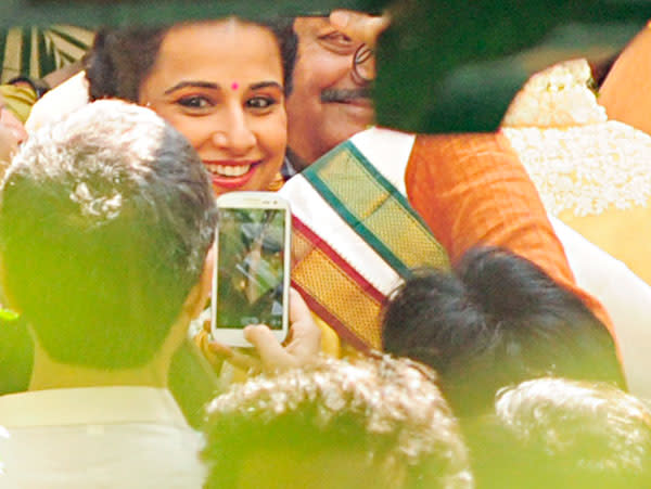 Vidya is all smiles as she goes through the rituals.