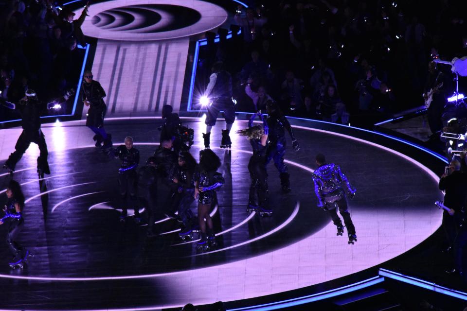 Usher skates around the Halftime Show stage