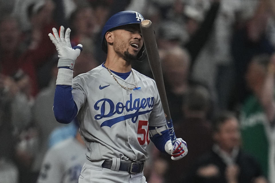 Los Angeles Dodgers' Mookie Betts reacts after striking out to Atlanta Braves pitcher Tyler Matzek to end the seventh inning in Game 6 of baseball's National League Championship Series Saturday, Oct. 23, 2021, in Atlanta. (AP Photo/Ashley Landis)