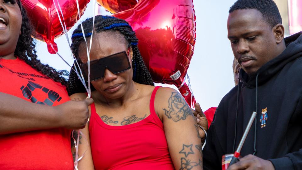People including family gathered at a vigil outside Orlando FreeFall Monday to honor 14-year-old Tyre Sampson, who fell from the ride and died last week.