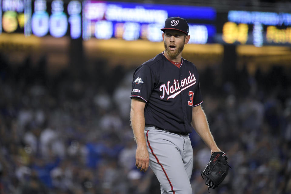 Washington Nationals starting pitcher Stephen Strasburg yells during the sixth inning in Game 2 of the baseball team's National League Division Series against the Los Angeles Dodgers on Friday, Oct. 4, 2019, in Los Angeles. (AP Photo/Mark J. Terrill)