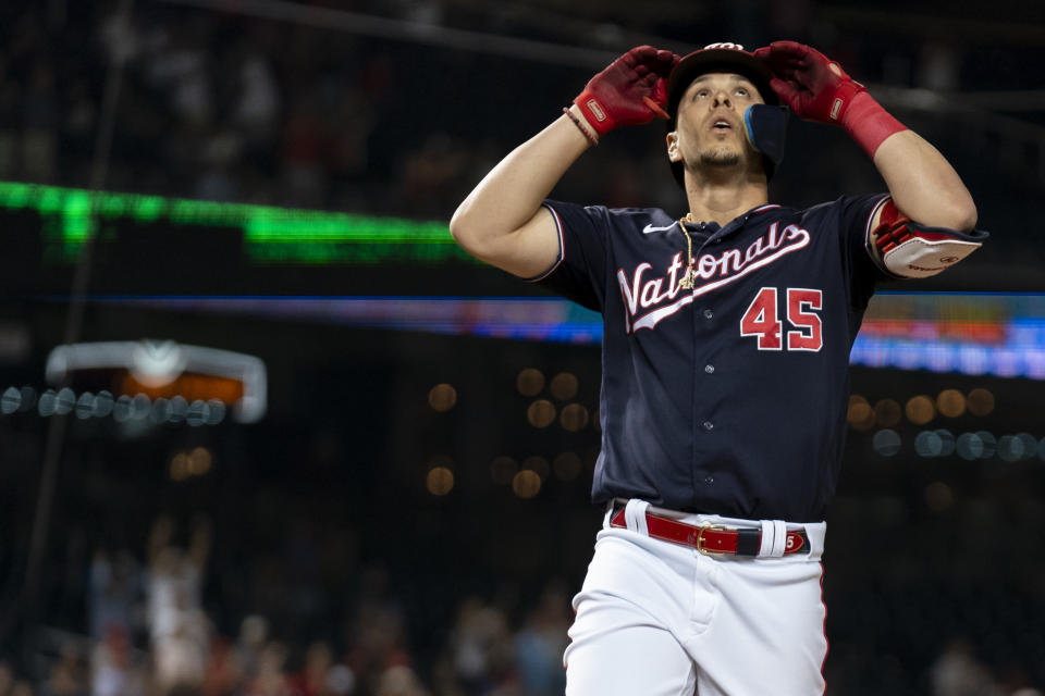 Washington Nationals' Joey Meneses celebrates after hitting a three-run home run against the Chicago White Sox during the seventh inning of a baseball game Tuesday, Sept. 19, 2023, in Washington. (AP Photo/Stephanie Scarbrough)