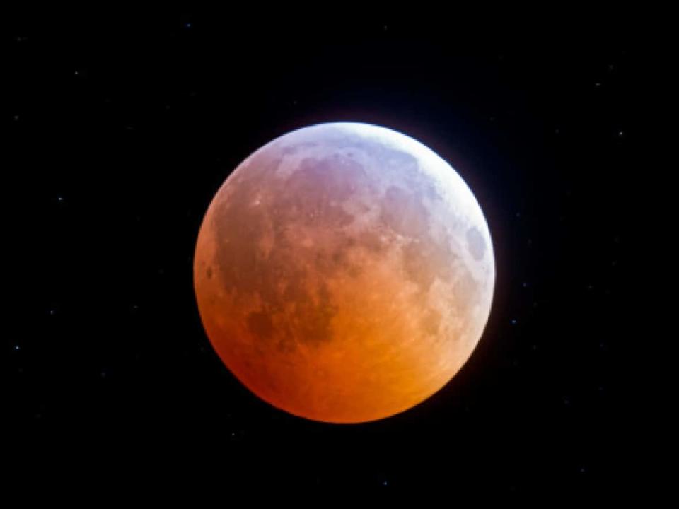 A photo of a total eclipse of the moon on Dec. 20, 2010.   (Photo by Alan Dyer - image credit)