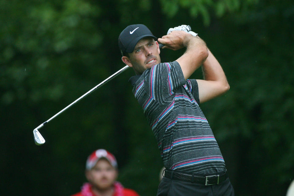 GREENSBORO, NC - AUGUST 19: Charl Schwartzel of South Africa hits his tee shot on the second hole during the final round of the Wyndham Championship at Sedgefield Country Club on August 19, 2012 in Greensboro, North Carolina. (Photo by Hunter Martin/Getty Images)