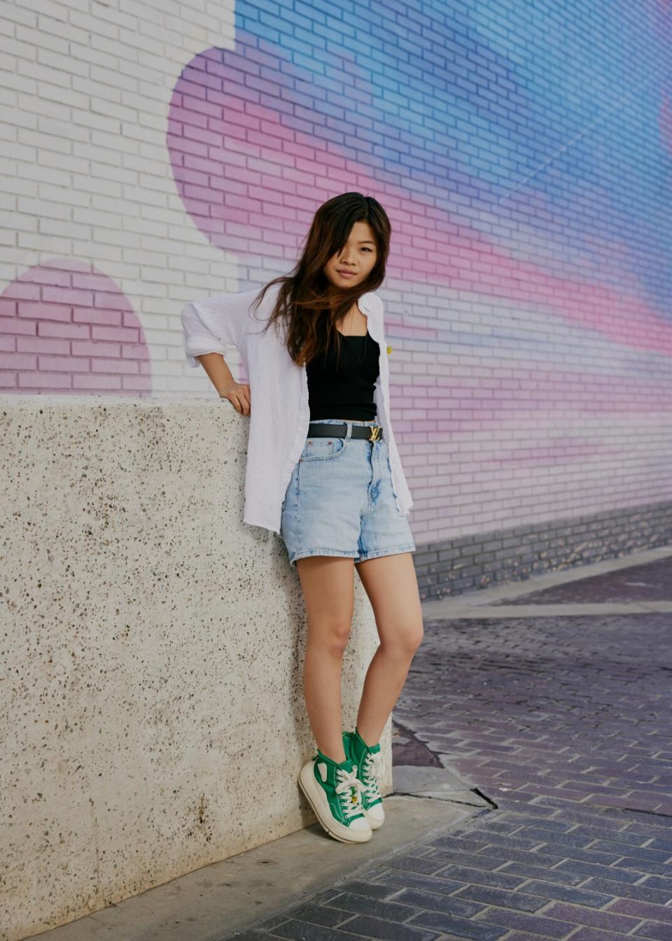 Miya Cech poses up against a wall in Little Tokyo.