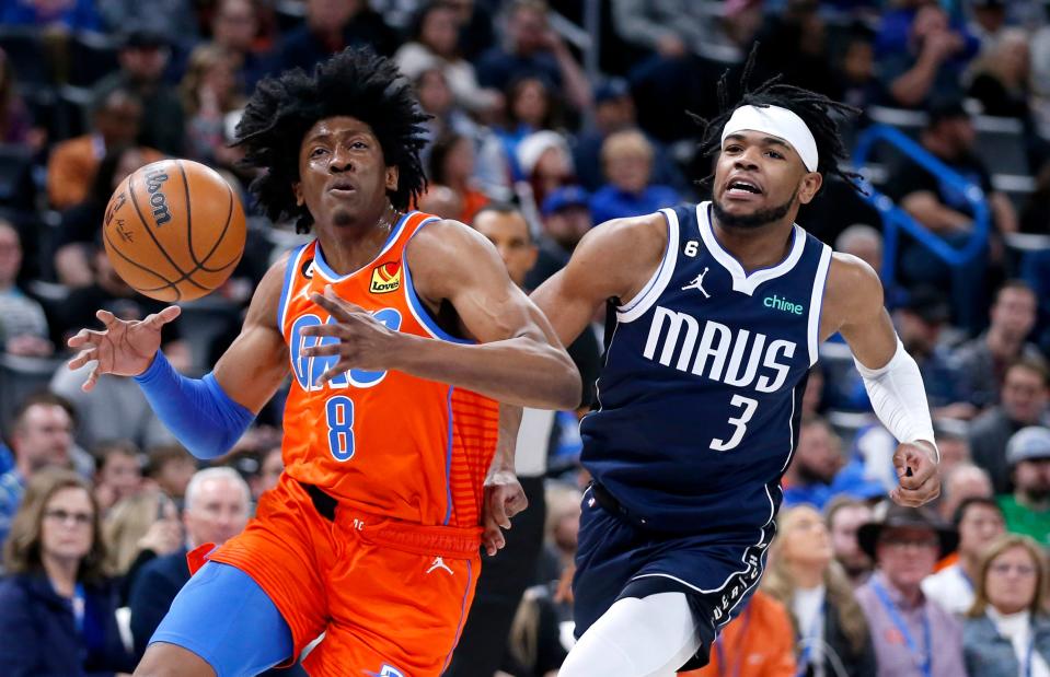 Oklahoma City's Jalen Williams (8) drives to the basket as Dallas' Jaden Hardy (3) defends during the NBA basketball game between the Oklahoma City Thunder and the Dallas Mavericks at the Paycom Center in Oklahoma City, Sunday, Jan.8, 2023. 