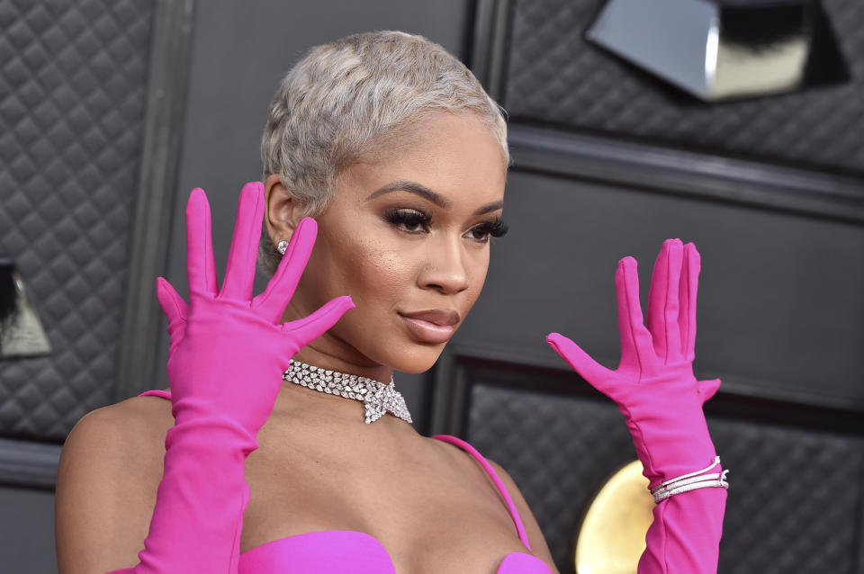 Saweetie arrives at the 64th Annual Grammy Awards at the MGM Grand Garden Arena on Sunday, April 3, 2022, in Las Vegas. (Photo by Jordan Strauss/Invision/AP)