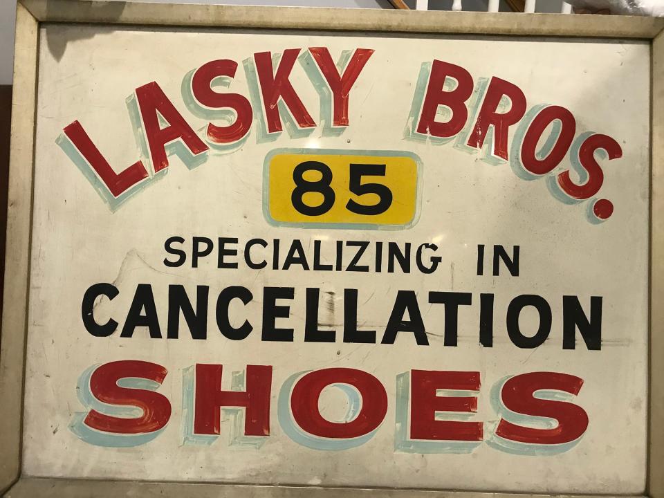 A sign for the shoe store owned by Fred Schiffman’s family at 85 Orchard St. on New York's Lower East Side. David Ng grew up on the same street, just doors away from the shoe store.