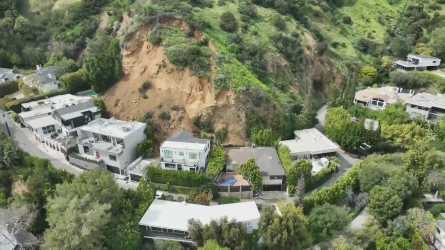 Hillside collapse in the Hollywood Hills caused by oversaturated soil.  The Los Angeles Fire Department marked three area homes on March 24, 2024. (KTLA)