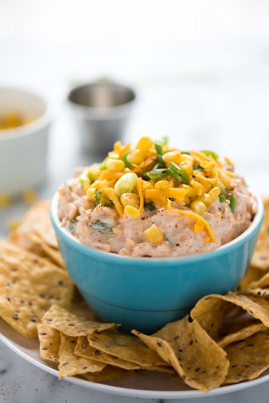 <p>With Salt and Wit</p><p>Simple and quick with crisp corn, cheddar cheese and a bit of spice.</p><p><strong>Get the recipe: <a href="https://withsaltandwit.com/greek-yogurt-spicy-corn-dip/" rel="nofollow noopener" target="_blank" data-ylk="slk:Spicy Corn Dip;elm:context_link;itc:0;sec:content-canvas" class="link ">Spicy Corn Dip</a></strong></p>